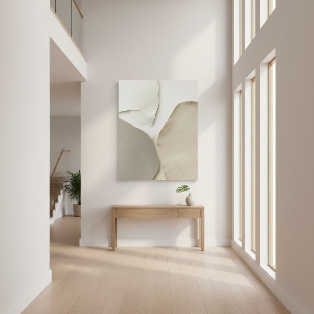 Modern interior with a console table and abstract wall art in a well-lit room.