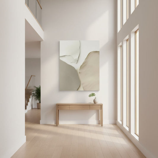 Modern interior with a console table and abstract wall art in a well-lit room.